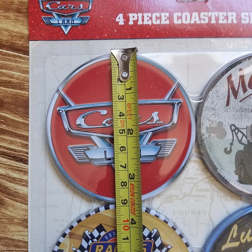 Pixar Cars Land 4 Piece Coaster Set Disney Parks Mater Lightning McQueen NWT